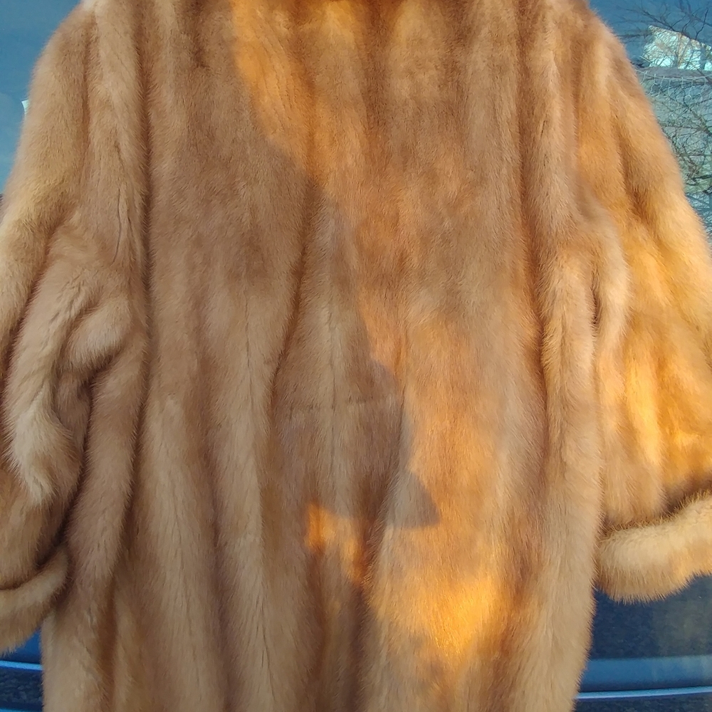 Ladies beautiful mink wrap style coat.